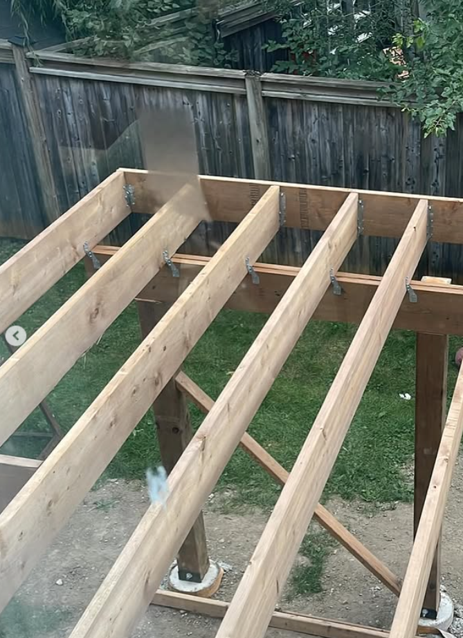 Timber joists and framing during residential deck construction
