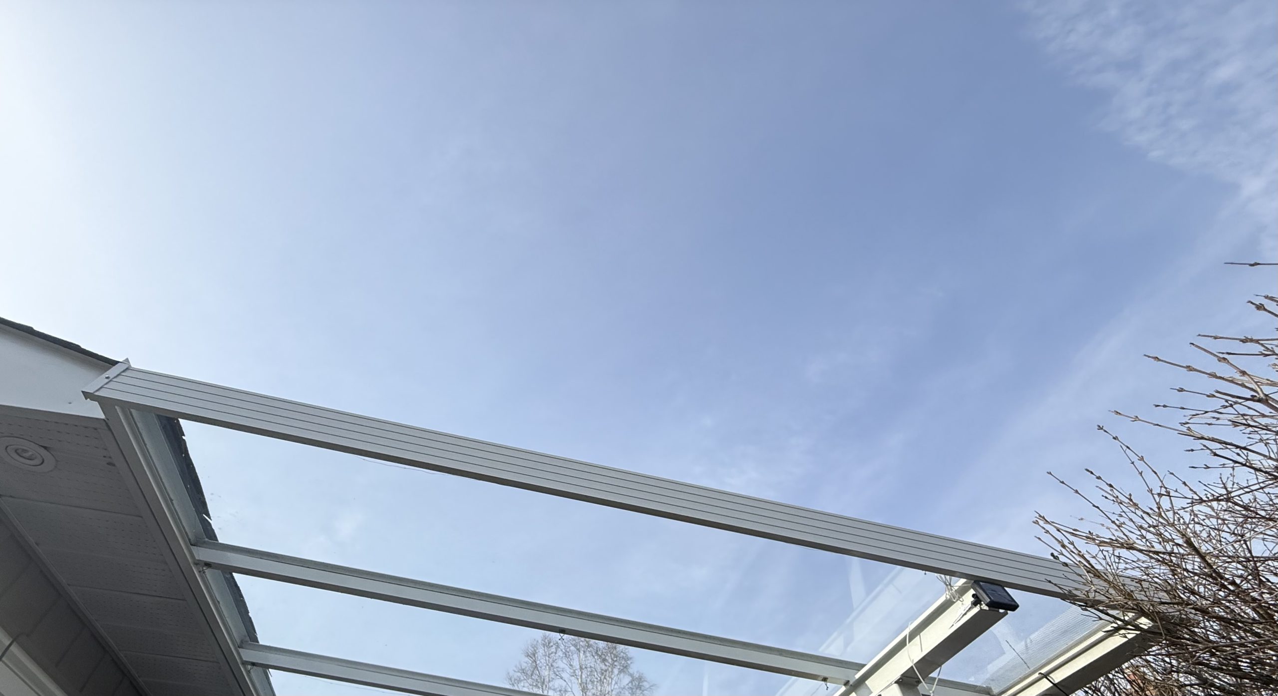 Existing aluminum and glazed residential porch cover reviewed for building permit